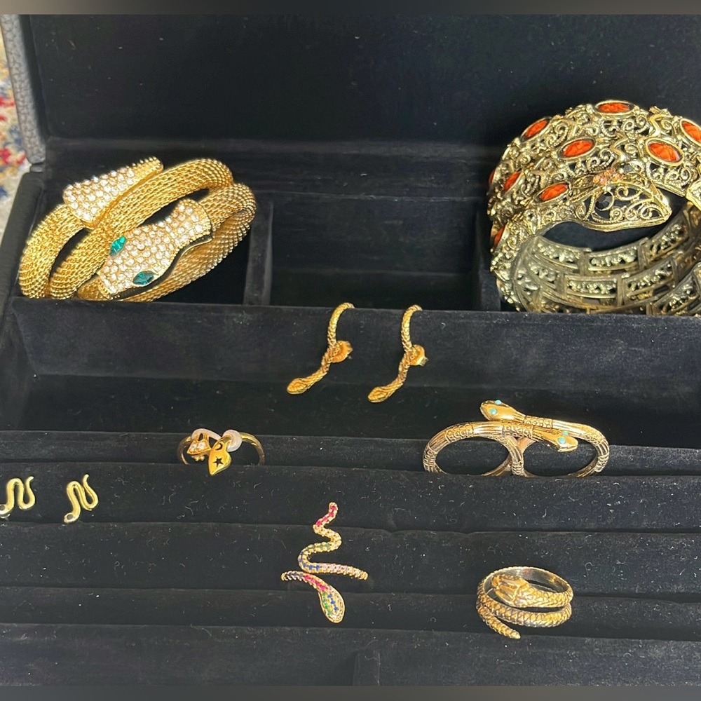 Lot of 8 Snake jewelry pieces. Cuffs, rings, earrings. gemstones.
